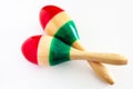 Two colorful maracas on white background. Cinco de mayo background