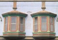 Two Colorful Old Windows Pattern Downtown Royalty Free Stock Photo