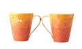 Two colorful porcelain tea mugs