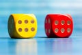 Two colorful wooden game dice showing number six, luck in board games, good chances, great odds abstract concept. Lucky roll Royalty Free Stock Photo