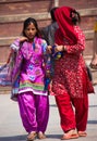 Two Colorfully Attired Women in Kathmandu Royalty Free Stock Photo