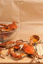 Two colossal steamed and seasoned chesapeake blue claw crabs on a wood cutting board Royalty Free Stock Photo