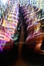 Two colourful rows of Dodgems facing each other. Intentional Camera Movement. ICM Royalty Free Stock Photo