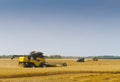 Two Combine Harvesters Cutting Wheat