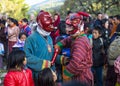 Two comedians tickle citizens during feast day , Bhutan Royalty Free Stock Photo