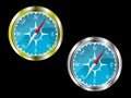 Two compasses in gold and silver Royalty Free Stock Photo