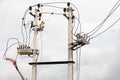 Two concrete electricity power pole connected with electric wires cable line