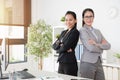 Two confidence Asian office lady cross arms