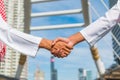 Two confident arab businessman shaking hands. Successful business partners. Negotiating business. Royalty Free Stock Photo