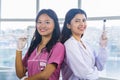 Two Confident Asian Nurse and Doctor standing side by side in a hospital Royalty Free Stock Photo