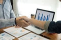 Two confident business man shaking hands during a meeting in the office, success, dealing, greeting and partner concept Royalty Free Stock Photo