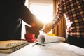 Two confident business man shaking hands during