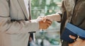 Two confident business man shaking hands during a meeting in the office, success, and partner Royalty Free Stock Photo