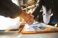 Two confident business man shaking hands during a meeting in the office, Royalty Free Stock Photo