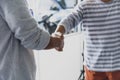 Two confident businessman shook hands during office meetings