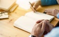 Two confident students doing homework together while sitting at the home or class room, selective focus Royalty Free Stock Photo