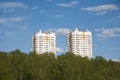 Two constructed multistory residential buildings in ecological place