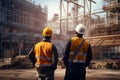 Two construction building men workers confidently inspect discuss engineering projects. Building construction company