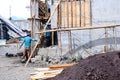 Construction site with workers building concrete. Royalty Free Stock Photo