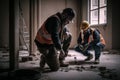 Two construction workers checking concealed pipe fittings of floor at a construction site. Building contractor with worker