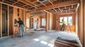 Two Construction Workers Inside a House Under Construction Royalty Free Stock Photo
