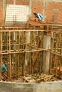 Construction site with bamboo scaffolding and. Royalty Free Stock Photo