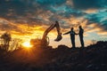 Two construction workers stand by an excavator at sunset Royalty Free Stock Photo
