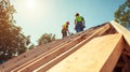 Two Construction Workers Standing on a Roof Framework Royalty Free Stock Photo
