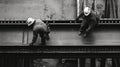 Two Construction Workers on a Steel Beam Royalty Free Stock Photo