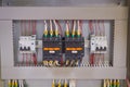 Two contactors, two circuit breakers and two phase control relays