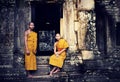 Two Contemplating Monk in Cambodia. Royalty Free Stock Photo