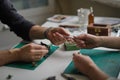 two contemporary working together in jewelry workshop. Master and apprentice. Young male assistant and female jeweler Royalty Free Stock Photo