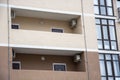 two cooling fans from the air conditioner on the wall of a residential building. Royalty Free Stock Photo