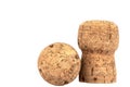 Two corks of champagne close-up on a white background Royalty Free Stock Photo