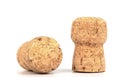 Two corks of champagne over a white background Royalty Free Stock Photo