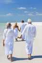 Two Couples Family Generations Walking on Beach Royalty Free Stock Photo