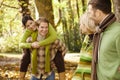 Two couples having fun in autumn park Royalty Free Stock Photo