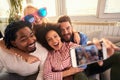 Two couples making funny selfie