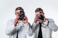 two cousin with retro photo camera. young confident brothers. confident model photographer Royalty Free Stock Photo