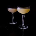 Classic Cocktails in Crystal Coupes Royalty Free Stock Photo