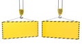 Two crane hooks with blank yellow plates