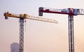 Two cranes. Sunset, Royalty Free Stock Photo