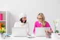 Two creative woman working together in office Royalty Free Stock Photo