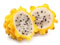 Two cross halves of yellow dragon fruit isolated on white background Royalty Free Stock Photo