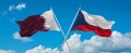 two crossed flags Czech Republic and Qatar waving in wind at cloudy sky. Concept of relationship, dialog, travelling between two