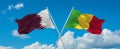 two crossed flags Mali and Qatar waving in wind at cloudy sky. Concept of relationship, dialog, travelling between two countries