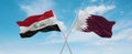 two crossed flags Qatar and Iraq waving in wind at cloudy sky. Concept of relationship, dialog, travelling between two countries