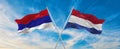 two crossed flags Republic Srpska and Netherland waving in wind at cloudy sky. Concept of relationship, dialog, travelling