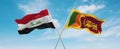 two crossed flags Sri Lanka and Iraq waving in wind at cloudy sky. Concept of relationship, dialog, travelling between two