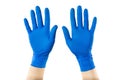 Two crossed hands in protective medical gloves with ope palms isolated at whitte background